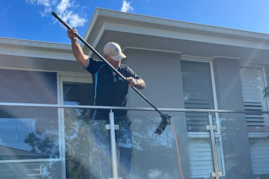 Illustration of glass railing cleaning service
